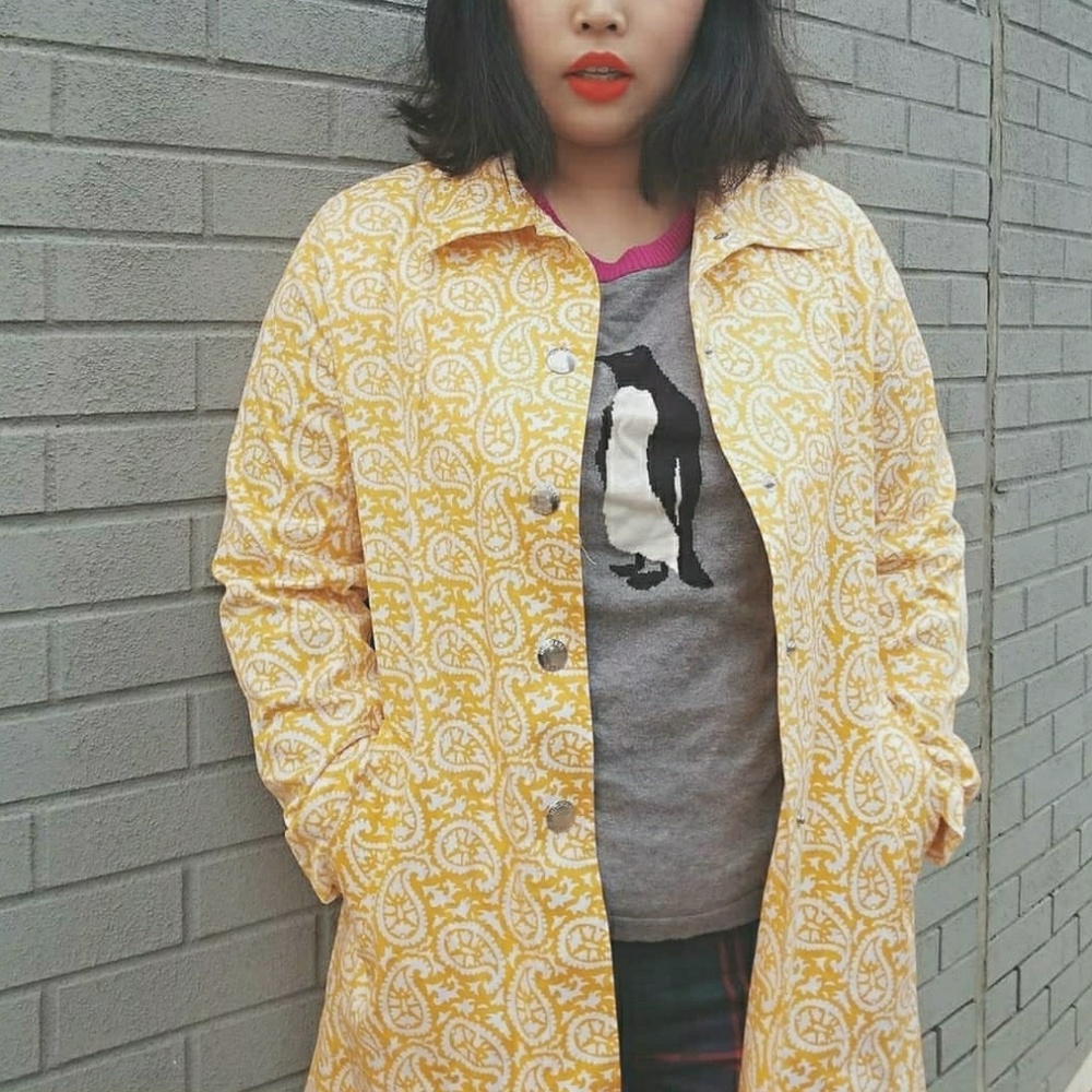 Yellow retro look trench coat
